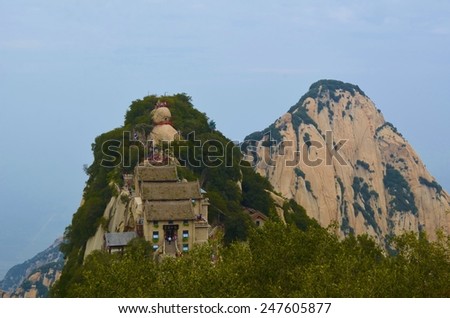 HUASHAN, CHINA, AUGUST 26, 2013: view of the hilltop of huashan mountain in china which is decorated with buddhist shrines.