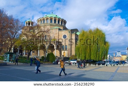 SOFIA, BULGARIA, NOVEMBER 14, 2014: people are walking in front of the saint nedelya church in sofia.