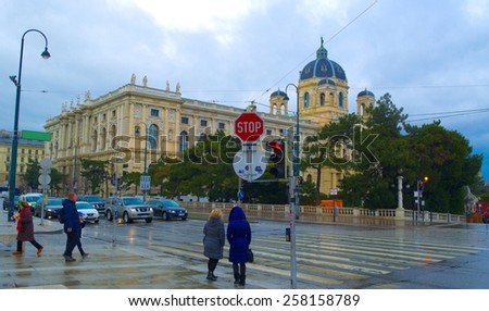 WIEN, AUSTRIA, JANUARY 4, 2015: people are crossing the street between natural sciences museum and museum quartier building in wien.