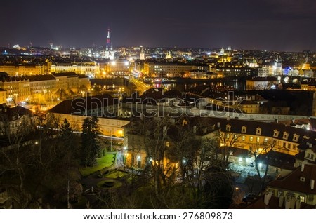 night view of prague including charles bridge, national theatre and old town square town hall taken from the prague castle.