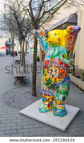 BERLIN, GERMANY, MARCH 12, 2015: painted bears are symbol of berlin streets because bear is one of the symbols of the town.