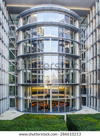 BERLIN, GERMANY, MARCH 12, 2015: people are gathering in a meeting hall in steel and glass building in berlin.