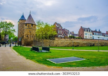 MAASTRICHT, NETHERLANDS, APRIL 12, 2014: Helpoort is one of the few functioning medieval gates to maastricht city in the netherlands and it is also part of fortification.