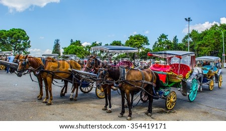 BUYUKADA, TURKEY, AUGUST 20, 2014: View over horse carriage parking lot next to the entrance to the monastery of saint george situated on buyukada island - part of princes islands - near istanbul.