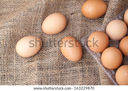 Eggs lay on sackcloth, selected focus
