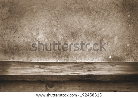 Background with wooden deck tabletop and black wall