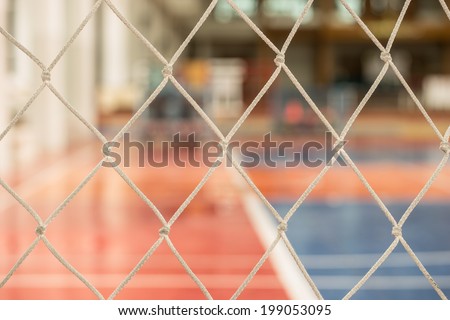 soccer net with out focus  indoor stadium background