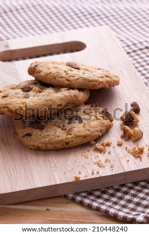 Stack of soft cookies on wooden plate