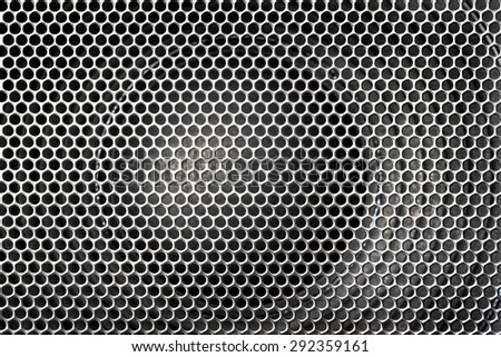 grid pattern cover bass speaker