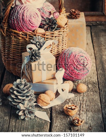 Vintage Christmas Composition With Box, Basket, Pine Cones And Walnuts