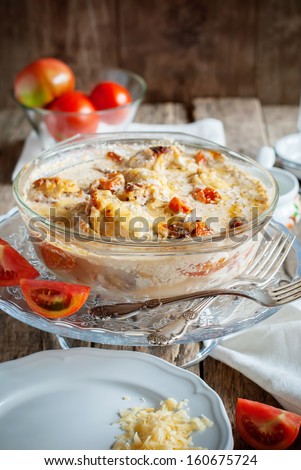Rabbit Cooked with Tomatoes in the Sour Cream and cheese