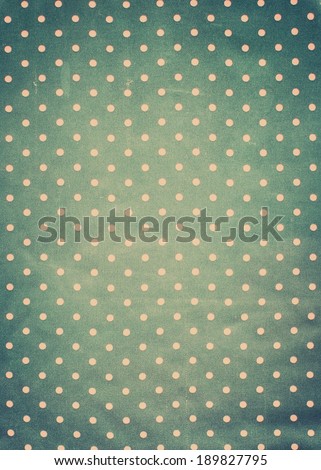 Vintage Fabric Texture Pattern with Pink Polka Dots on Grey background, retro style with vignette