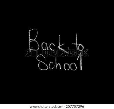 Back to School test on chalkboard, school theme, vintage background isolated on black