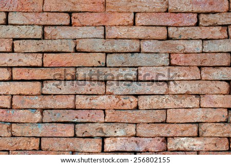 Porous red bricklaying without filling with cement, background