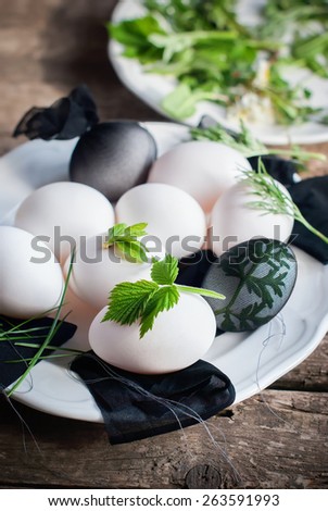 Eggs in Stage of Preparation of Decor for Happy Easter. Bio and Natural way of painted  with Fresh Leaves and Boiled in Onions Peels