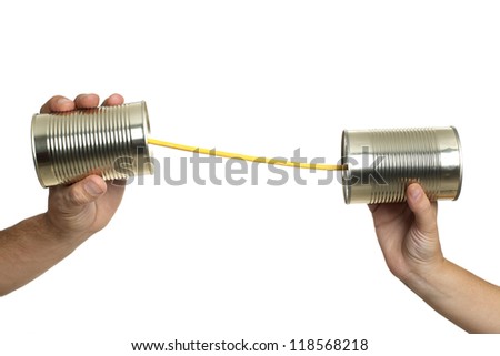 Concept about communications with 2 tin cans and a string, in white background, isolated.