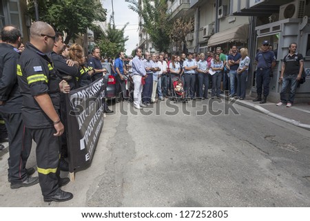 ALEXANDROUPOLIS, GREECE - SEPT 26: Protesters in city streets during protest rally against the greek government\'s new economic measures on September 26, 2012 in Alexandroupolis, Greece.