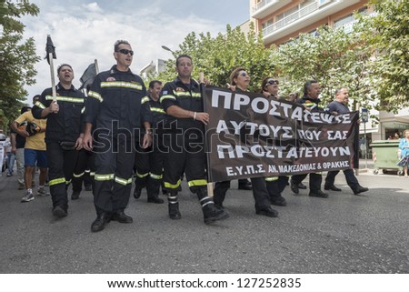 ALEXANDROUPOLIS, GREECE - SEPT 26: Protesters in city streets during protest rally against the greek government's new economic measures on September 26, 2012 in Alexandroupolis, Greece.