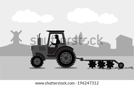 tractor processes the earth a rural landscape