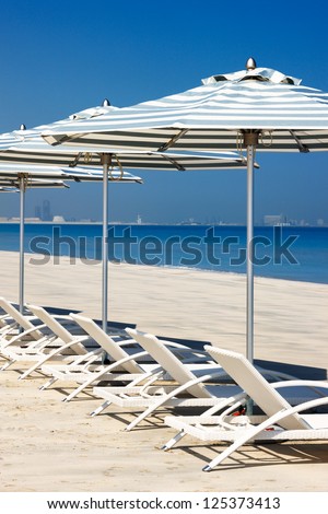 Reclining deck chairs, beach umbrellas, and the beach are the aspiration of most holiday makers