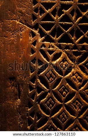 An ancient hand carved door from Arabia, the design is wonderfully interact and it\'s irregularity exemplifies that it was definitely hand carved.