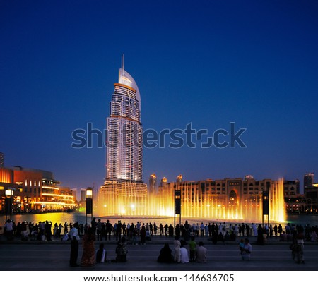 DUBAI, UAE - JUL3 : The Dubai Fountain on Jul 3, 2013 in Dubai. Dubai's best attraction, with 6600 lights, 275 m long and shoots water up to 150 m into the air accompanied by a range of world music