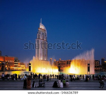 Dubai, Uae - Jul3 : The Dubai Fountain On Jul 3, 2013 In Dubai. Dubai'S Best Attraction, With 6600 Lights, 275 M Long And Shoots Water Up To 150 M Into The Air Accompanied By A Range Of World Music