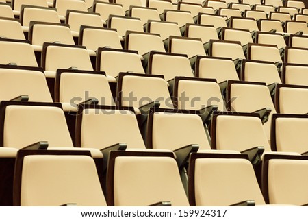 A beautiful pattern of auditorium seats built to celebrate gatherings of people, primarily for education and entertainment