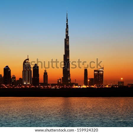 Dubai Skyline At Dusk Seen From The Gulf Coast, Shows The Sky Scrapers Of The Sheikh Zayed Road