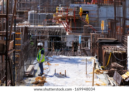DOHA, QATAR - NOV 13: Reinforced concrete gets it\'s strength from steel bars cast within the concrete on Nov 13, 2013 in Doha, Qatar. Doha, is preparing it\'s infrastructure for the World Cup in 2022