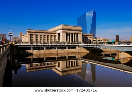 PHILADELPHIA - DEC 1: The 30th Street Station is reflected in the still waters of The Scullykill River, as seen from the Norman Cohn Family, Market Street Bridge on Dec 1, 2013 in Philadelphia, USA