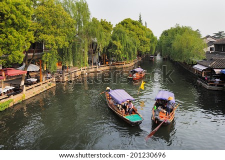 ZHOUZHUANG, CHINA - MAY 2: Zhouzhuang, the most famous water townships in China on May 2, 2014 in Zhouzhuang, China. Noted for its profound cultural background, has been called the Venice of the East