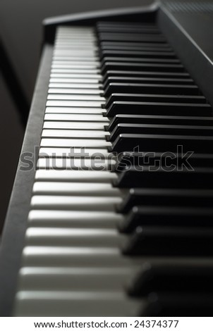 Low key photo of the keyboard of a  piano