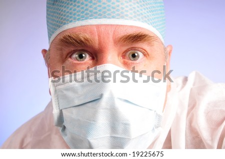 Doctor or medical worker in a hat and mask not sure look