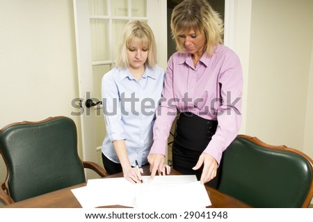 Women working together as a team in the office or work place