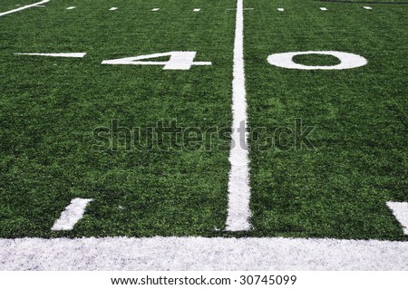 the fourty yard line of a football field and side line markers