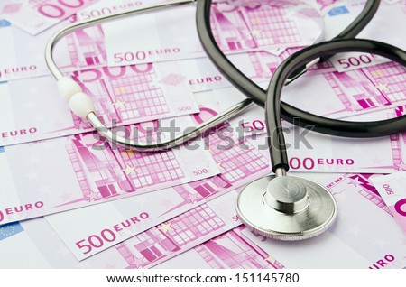Health care costs .Stethoscope and money symbol for health care costs or medical insurance