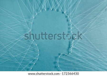 Personal communication. The head of a man connected to exterior by threads