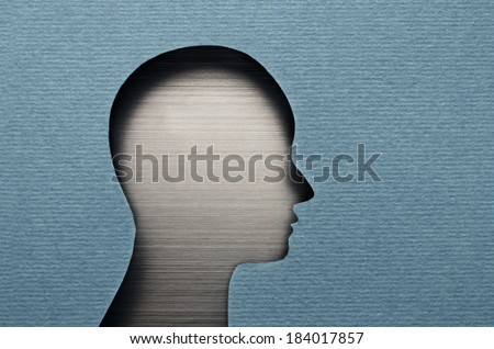 Human head cardboard cutout with copy space
