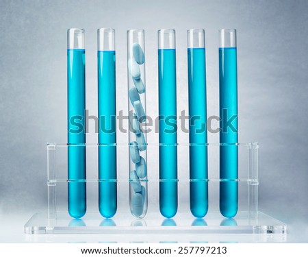 Pharmaceutical research. Pills in test tubes