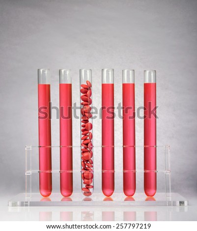 Pharmaceutical research. Pills in test tubes