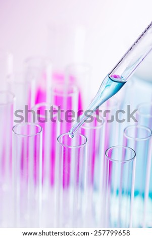 Scientific research. Laboratory pipette used to transfer a small amount of liquid to a test tube