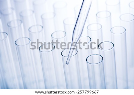 Scientific research. Laboratory pipette used to transfer a small amount of liquid to a test tube