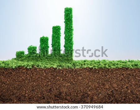 Business growth concept with grass growing in shape of graphic bar