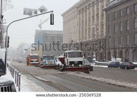 Kiev, UKRAINE - 05 February 2015: Center of the capital. Snow machines clean roads from fallen snow