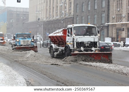 Kiev, UKRAINE - 05 February 2015: Center of the capital. Snow machines clean roads from fallen snow