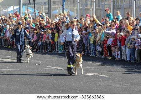 Kiev, Ukraine - October 04, 2015: Emergency rescue service. Rescuers with dogs to train before the audience