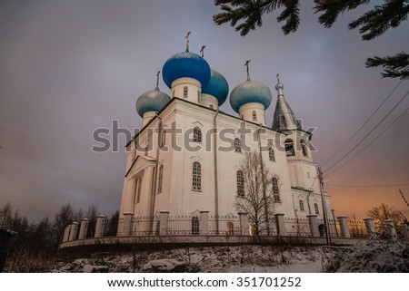 Community church at dusk during the winter in Arkhangelsk