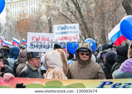 MOSCOW, RUSSIA - MARCH 2: Russian demonstrators holding posters with text 