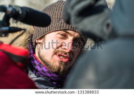 MOSCOW - MARCH 8: Pyotr Verzilov, Nadezhda Tolokonnikova\'s husband, being interviewed on picket to free Pussy Riot members on March 8, 2013 in Moscow.